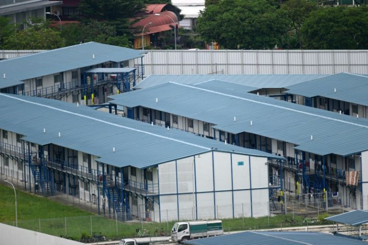 The government maintains that curbs on migrants are necessary as there is a higher risk of virus transmission due to their living conditions