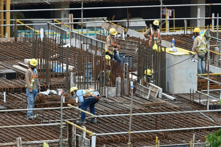 Migrants have for decades done the back-breaking work of constructing the financial hub's gleaming skyscrapers, cleaning housing estates and maintaining public transportÂ