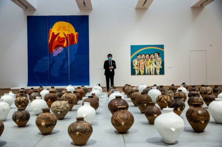 Whitewash (1995-2000) by Chinese artist Ai Weiwei (below) at the M+ Museum in Hong Kong