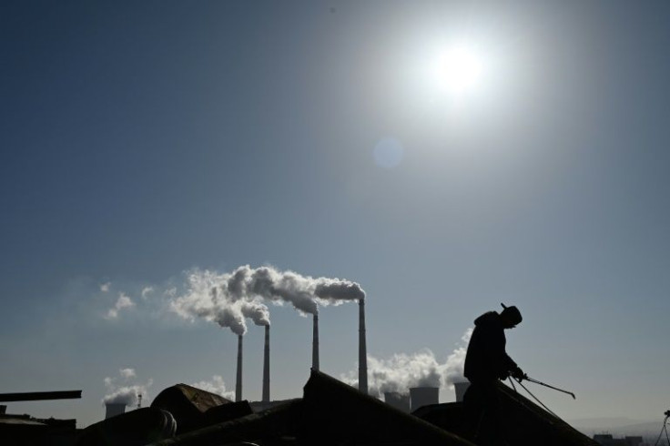 A new draft text urged nations to accelerate efforts to phase-out of unfiltered coal and "inefficient" fossil fuel subsidies