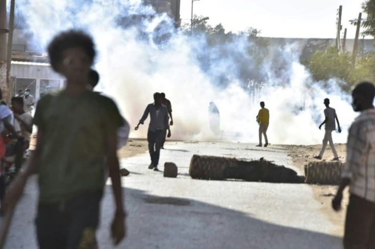 Security forces fired tear gas at anti-coup demonstrators in Sudan and live rounds that killed several according to medics