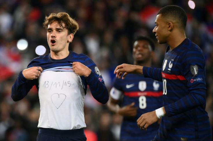 France forward Antoine Griezmann (left) and Kylian Mbappe celebrate as the French secured their World Cup qualification