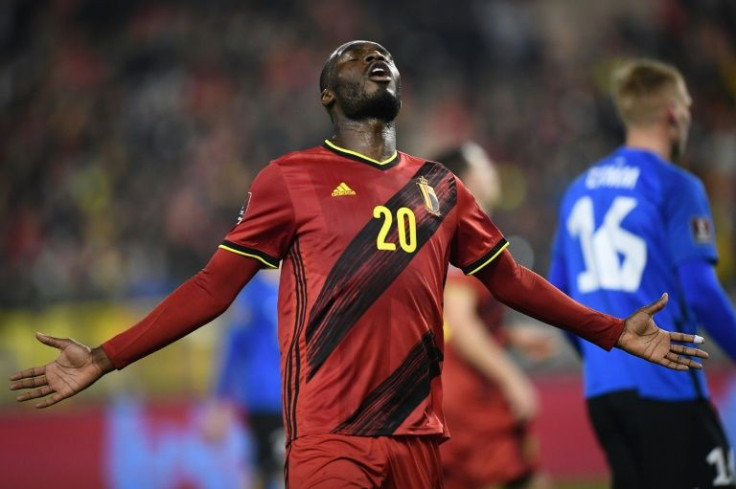 Christian Benteke scored Belgium's opener as in a 3-1 win over Estonia that booked their passage for the World Cup finals