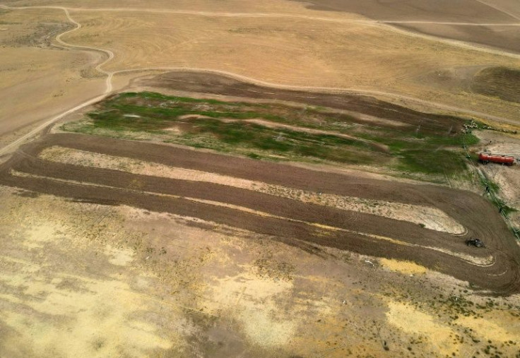 The so-called Fertile Crescent in northern Iraq is where agriculture was born 12,000 years ago but with temperatures soaring above 50 degrees Celsius (122 degrees Fahrenheit) fields have dried up forcing the displacement of hundreds of families