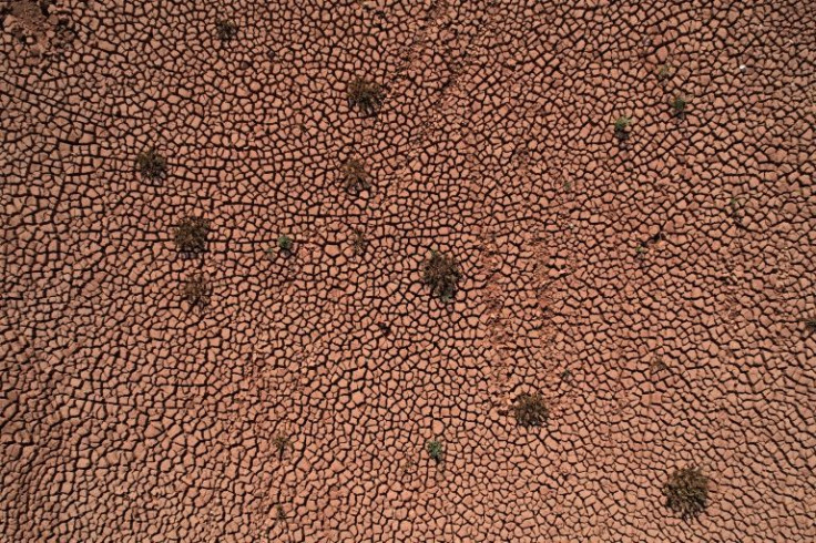 An aerial view shows dry and cracked soil at Zawita Dam near the northern Iraqi town of Dohuk