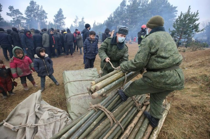 Belarusian authorities have helped set up tents and other facilities at a migrant camp