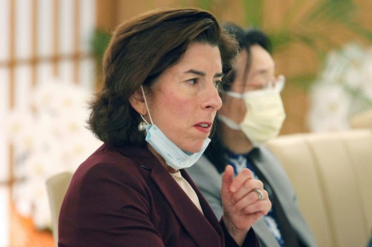 US Secretary of Commerce Gina Raimondo (L) held talks with Japan's trade minister Koichi Haguida