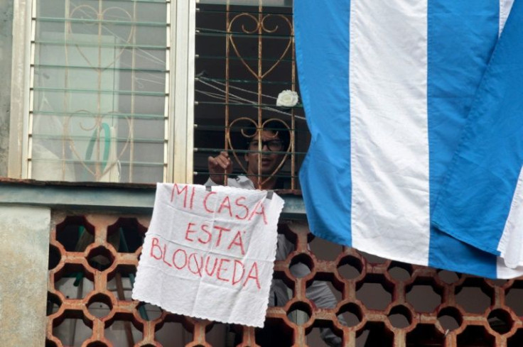 Cuban security forces surrounded the home of one of the organizers of a planned protest as he was preparing to set off on a solo march