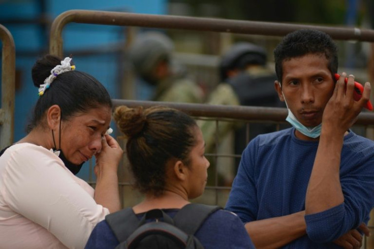 Relatives are desperate for news after 68 inmates were reported killed in rioting at a prison in Ecuador
