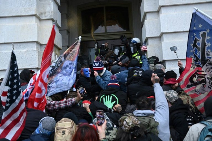 Donald Trump supporters clashed with security forces as they stormed the US Capitol on January 6, 2021, hoping to reverse his loss in the presidential election
