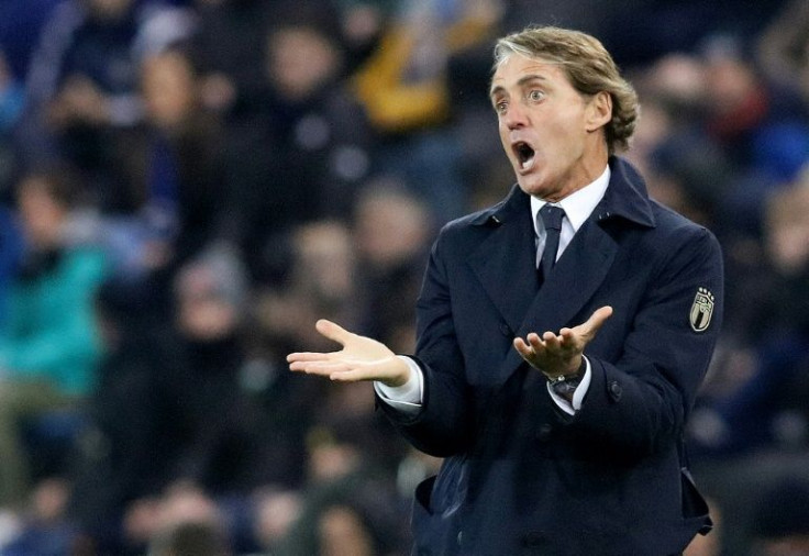 Roberto Mancini laments Italy's inability to take chances as they failed to beat Northern Ireland, missing out on automatic qualification for the World Cup
