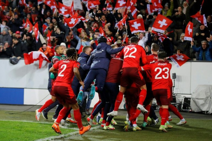 The Swiss players celebrate their fourth goal against Bulgaria which secured automatic passage to the 2022 World Cup