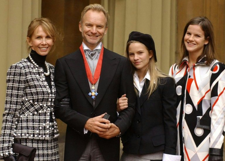 With his wife Trudi Styler, and two daughters Coco and Kate when receiving a knighthood in 2003
