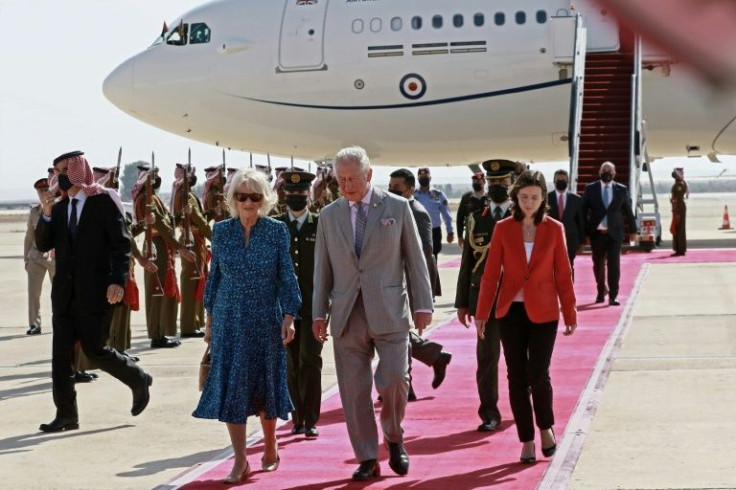 Britain's Prince Charles and his wife Camilla arrive in Jordan