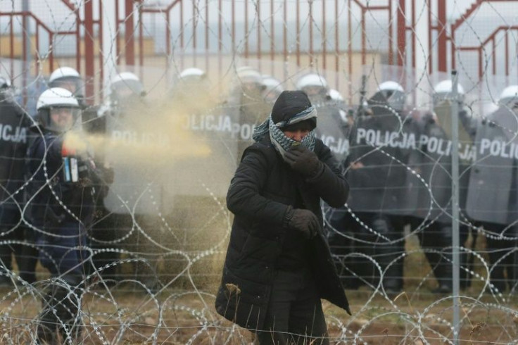 Migrants clashed with Polish law enforcement officers as they attempted to enter the country from Belarus
