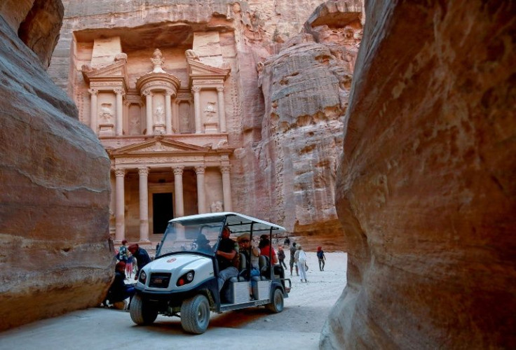 Ten electric carts have replaced 12 of the more traditional animal-powered carriages for tourists visiting Jordan's landmark site of Petra