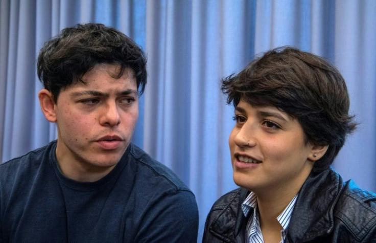 Irish national Sean Binder (l) and Syrian refugee Sarah Mardini pictured in December 2018 after their release from pre-trial detention