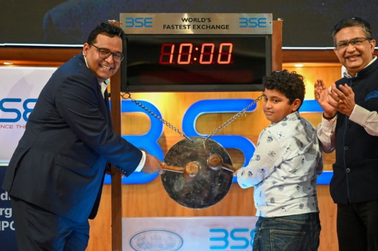 Sharma (L) --Â a schoolteacher's son who says he learned English by listening to rock music -- retains a 14 percent stake in the business