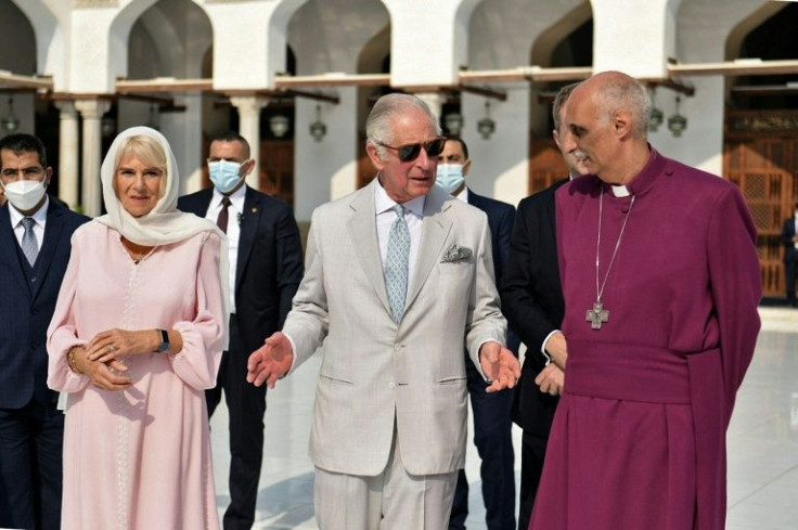Britain's Prince Charles (C), Prince of Wales, and Camilla (L), Duchess of Cornwall, visit the al-Azhar mosque in the Egyptian capital Cairo