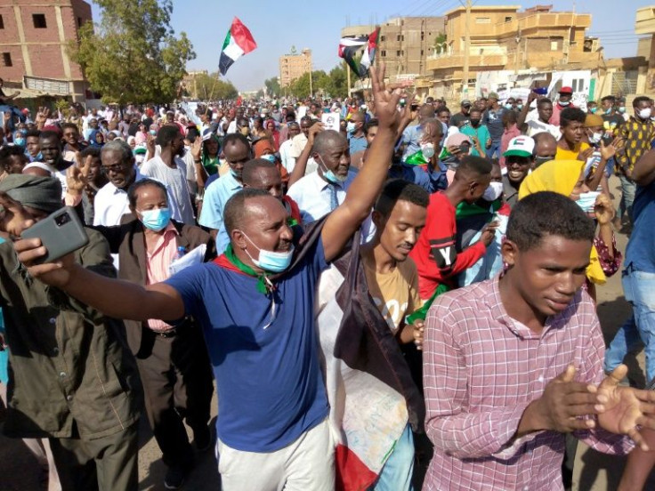 Anti-coup protesters march through Khartoum's twin city of Omdurman on Wednesday braving a mounting crackdown by Sudan's military authorities