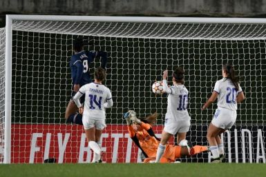 Marie-Antoinette Katoto (L) scores the opener for PSG against Real Madrid