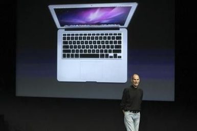 Apple CEO Steve Jobs unveils the company&#039;s latest thinner MacBook Air during a news conference at Apple Inc. headquarters in Cupertino, California October 20, 2010.