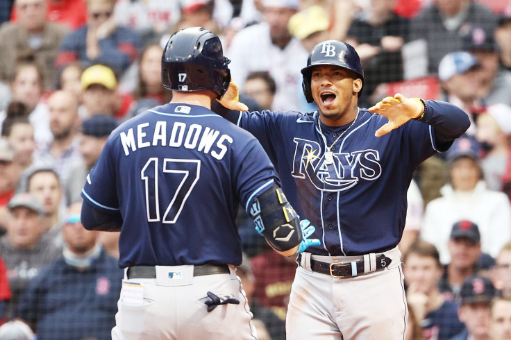 Austin Meadows #17 celebrates with Wander Franco #5 of the Tampa Bay Rays 