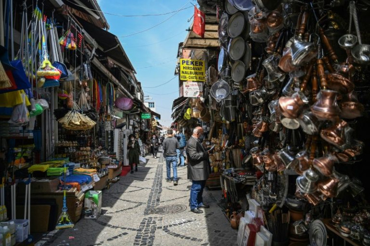 Shopping near the Spice Bazaar in Istanbul's Eminonu district -- but a Turkish currency crisis means consumers must budget carefully