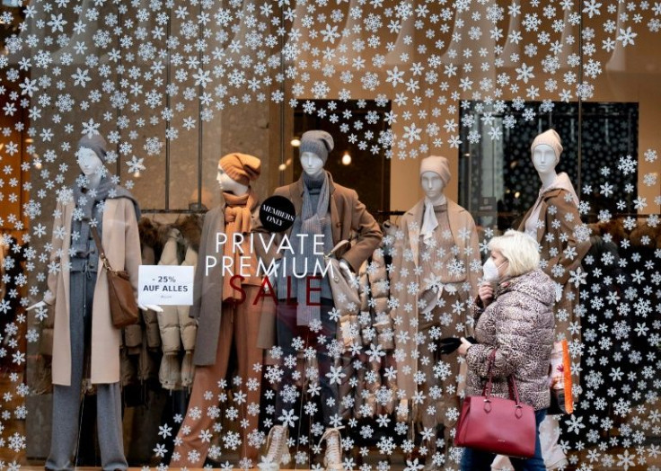 The Christmas displays are up in Vienna's Mariahilferstrasse, but shopkeepers are worried about losing trade at this vital time in the retail year