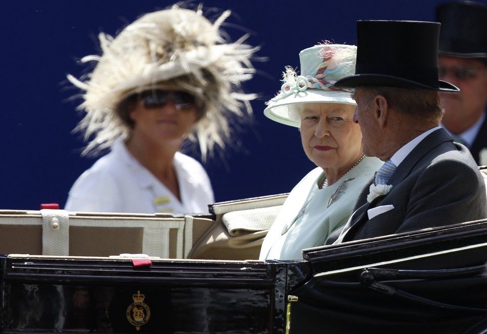 Britain039s Queen Elizabeth and Prince Philip arrive for the first day of racing at Royal Ascot in southern England
