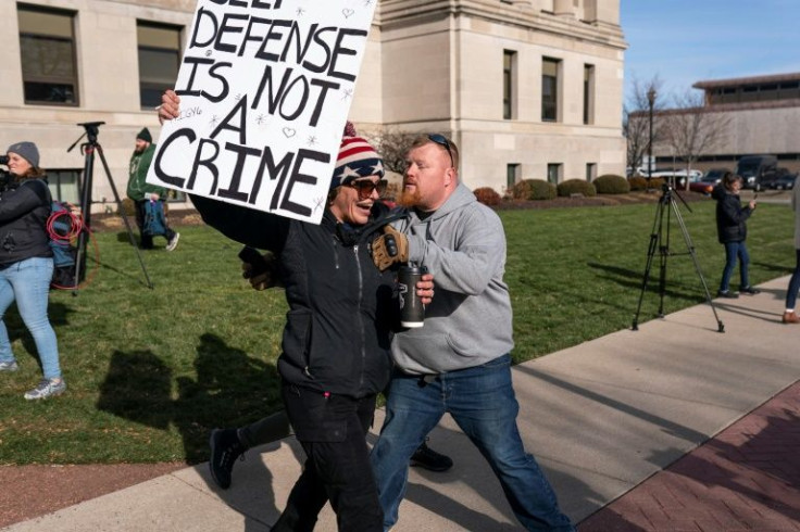 A supporter of Kyle Rittenhouse reacts to the not guilty verdict