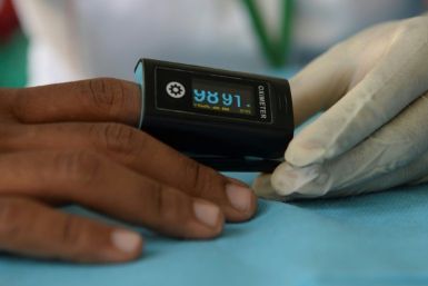 Britain's health secretary cited research showing that oximeters are less accurate on people with darker skin as highlighting the potential problem