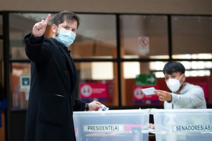 Chilean presidential candidate Gabriel Boric cast his vote as polls opened in the South American nation
