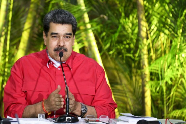 This handout picture released by the Venezuelan presidential press office, shows President Nicolas Maduro speaking during an event in Caracas on November 8, 2021