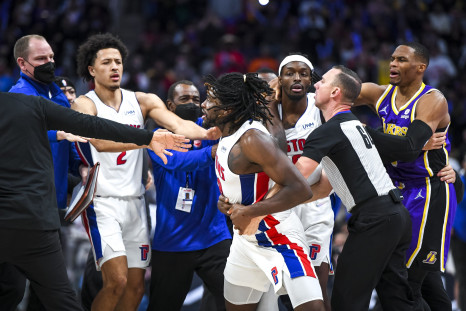 Isaiah Stewart #28 of the Detroit Pistons is restrained as he goes after LeBron James #6 of the Los Angeles Lakers 