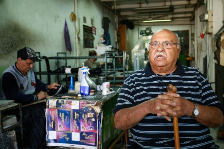 Jamil Kopti, 90, the oldest shoemaker in Amman, at his workshop in Jordan's capital
