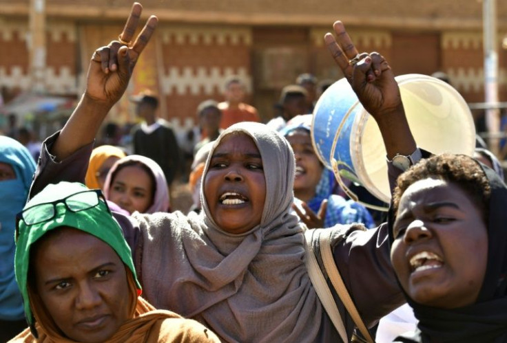 A Sudanese protester in Omdurman on November 21; street protests have continued despite a deal announced on Sunday to release the prime minister