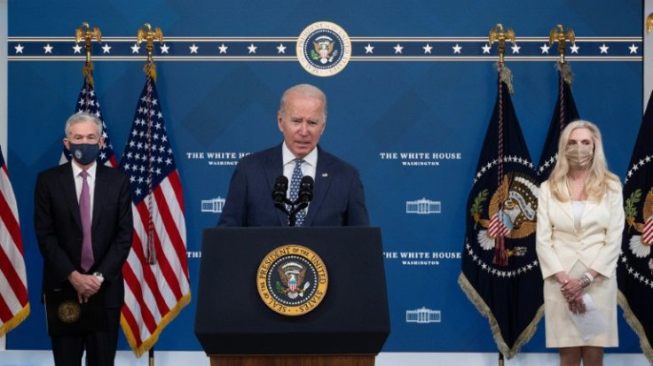 President Joe Biden (C) said he decided on appointing a Republican Fed chair (Jerome Powell, on left) and a Democratic vice chair (Lael Brainard, on right) because "broad bipartisan support is important"