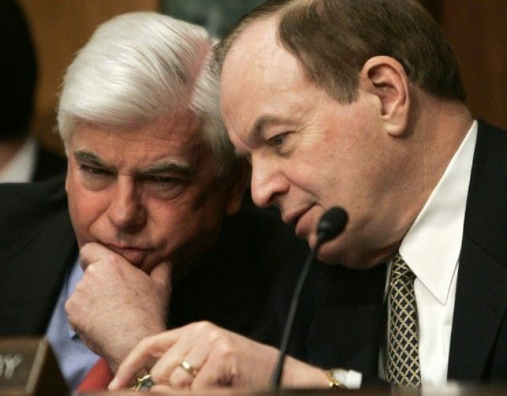 Christopher Dodd (D-CT) (L) confers with Sen. Richard Shelby (R-AL)