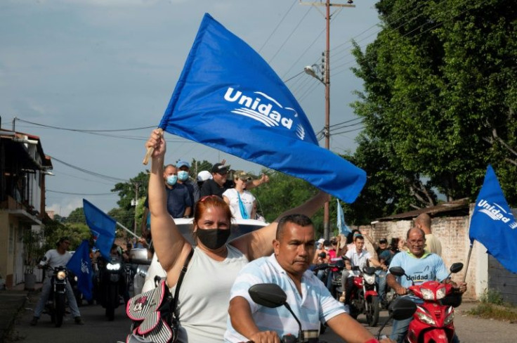 Supporters of the Democratic Unity Roundtable alliance, which was only reinstated five months before the regional elections, show their support in September 2021