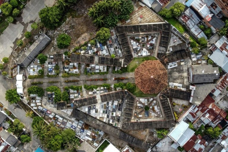 Townsfolk come every day to La Dolorosa cemetery to tend to the graves of the unknown dead