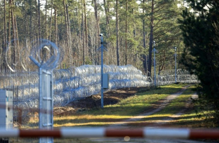 Barbed wire fence at the Lithuanian-Belarusian  border in Sadziunai, Lithuania