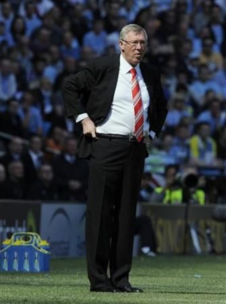 Manchester United's manager Ferguson watches from the touchline during their English Premier League soccer match against Manchester City in Manchester