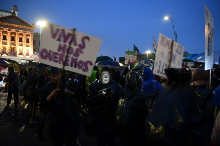 Women take part in a demonstration on the International Day for the Elimination of Violence against Women in Montevideo