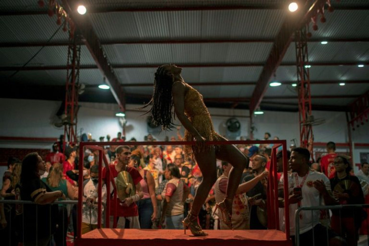 Viradouro's Samba Queen Erika Januza dances on a dais during the samba school's rehearsal, in preparation for the upcoming 2022 carnival, in Niteroi, Rio de Janeiro state, Brazil