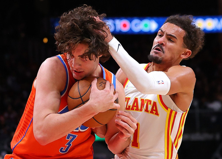  Trae Young #11 of the Atlanta Hawks defends against Josh Giddey #3 of the Oklahoma City Thunder