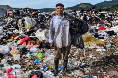 Marlon Escoto has spent 45 years picking through rubbish at a municipal dump in Honduras to try to find things to sell and earn a living