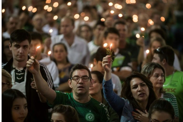 People attend a ceremony in honour of the victims and survivors of Lamia flight 2933 on the first anniversary of the plane crash in Colombia that wiped out Brazilian football club Chapecoense, at the Arena Conda stadium, in Chapeco, Santa Catarina, Brazil