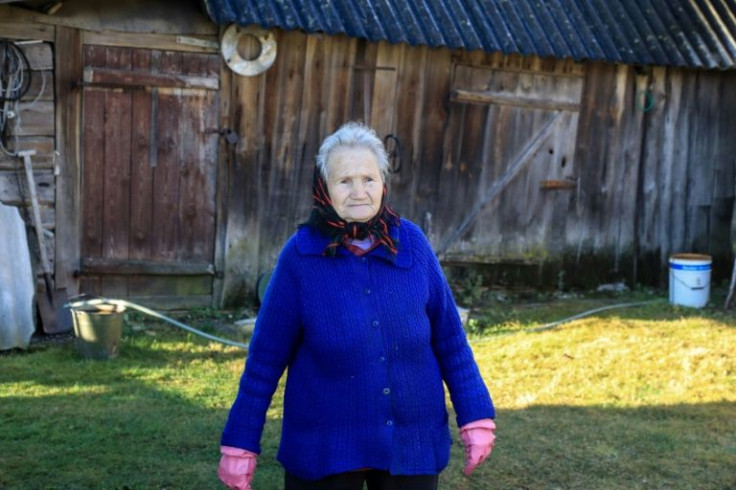 Lithuanian villagers like Jadvyga Mackevic who live near the Belarusian border support their government's tough line on migrants