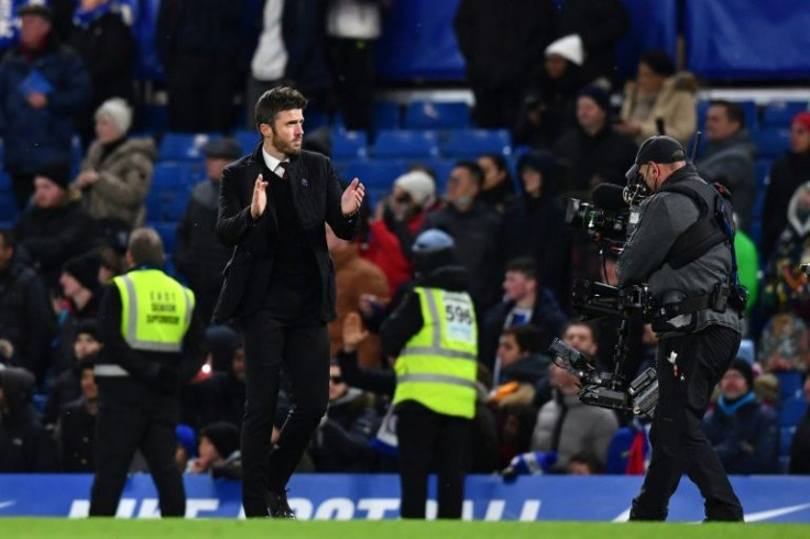 Creditable result - Manchester United caretaker manager Michael Carrick applauds the fans after a 1-1 draw away to Premier League leaders Chelsea